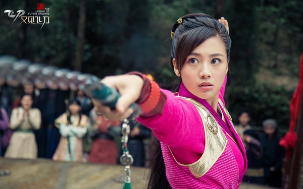 Girl in pink outfit doing a battle stance