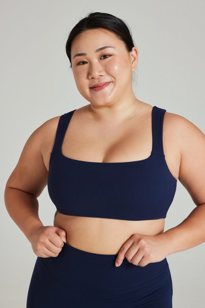 A plus size women wearing an activewear