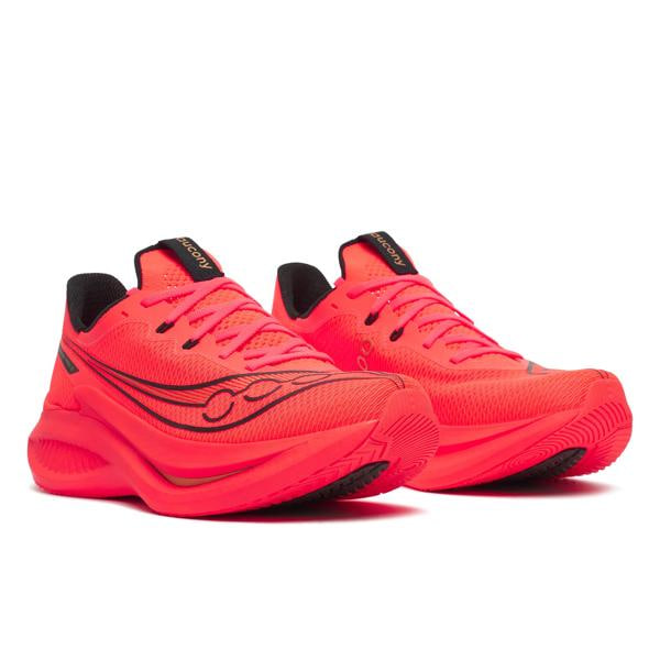 Saucony red and black road running shoes pair