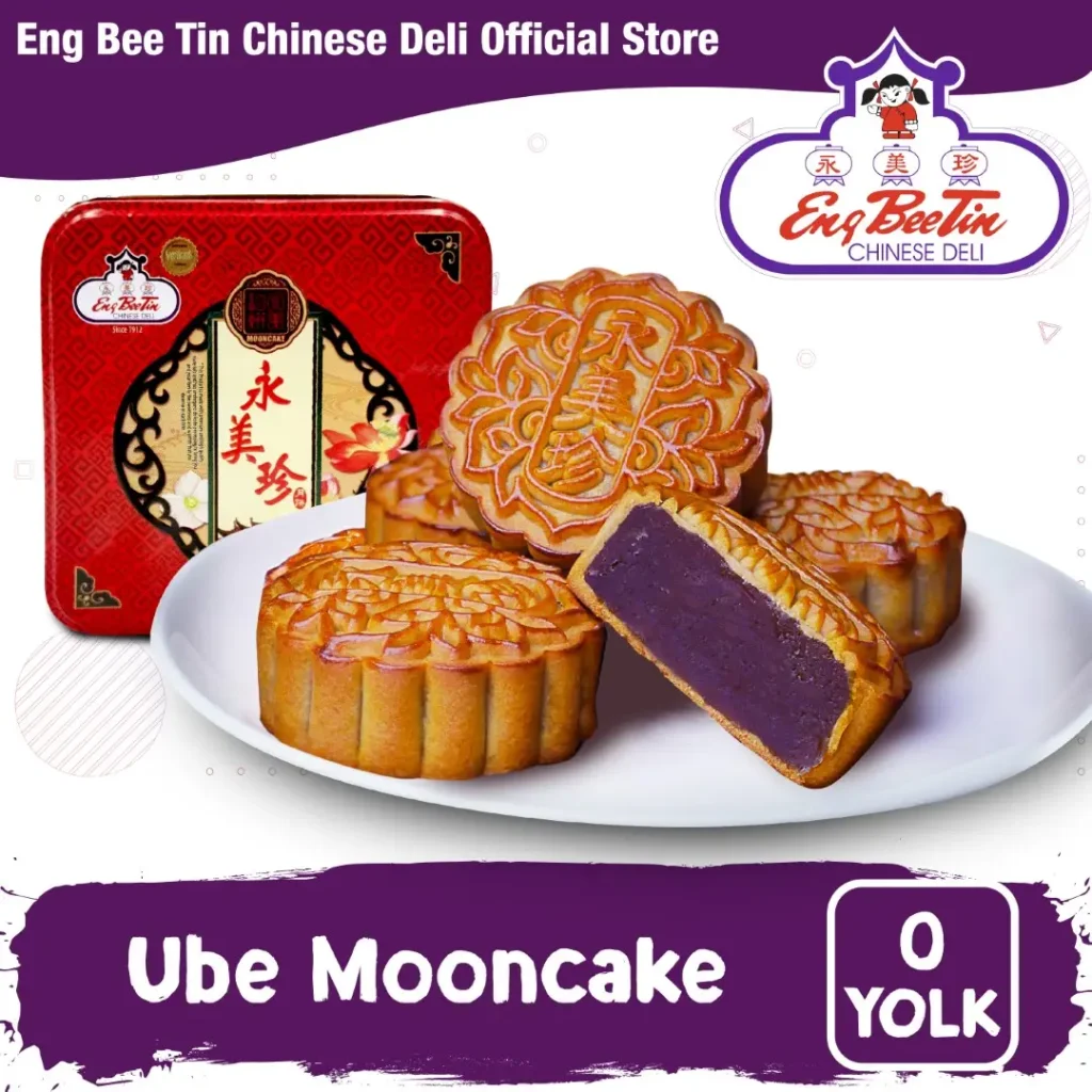 Eng Bee Tin ube mooncake with purple yam filling sliced open, red tin gift box